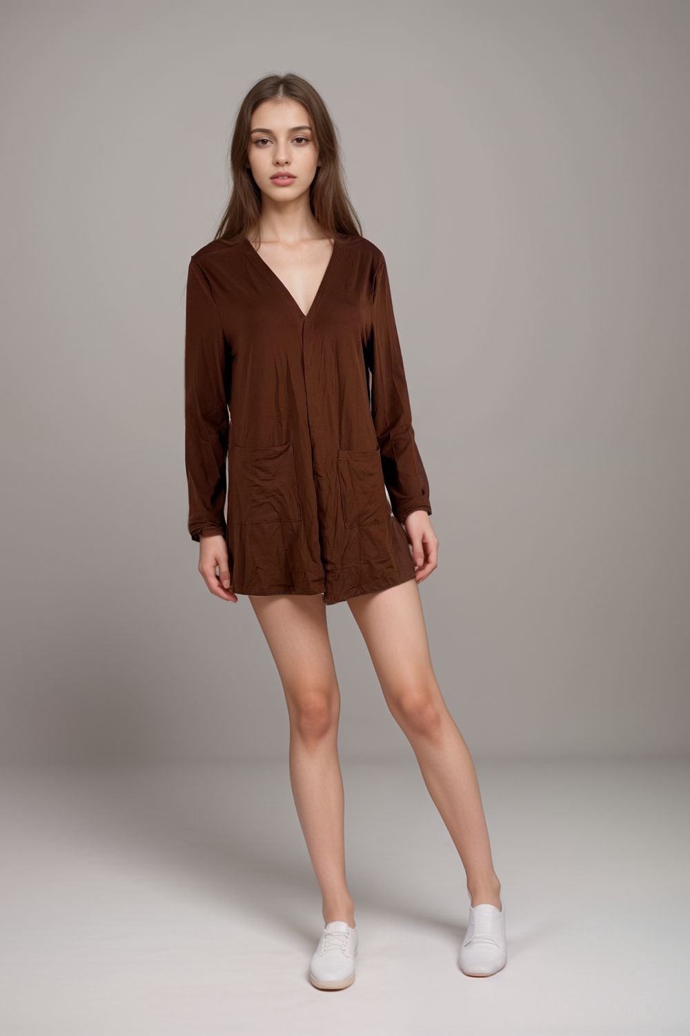 Brown V neck long sleeve romper with pockets in relaxed fit for women