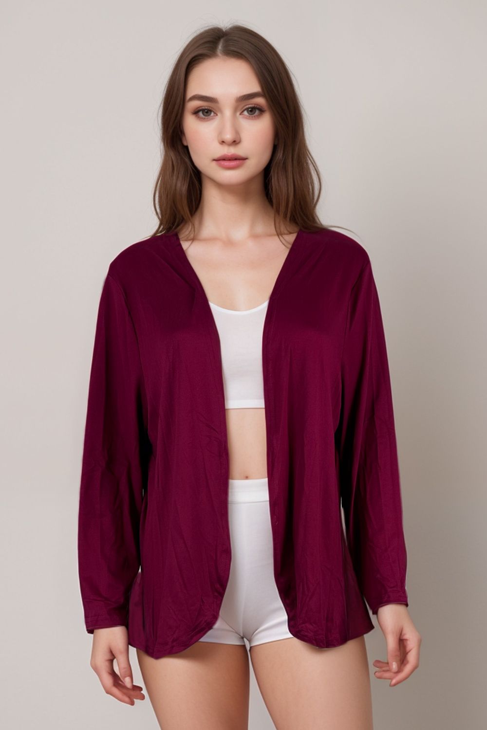 Woman wearing burgundy long sleeve open-front lounge cardigan
