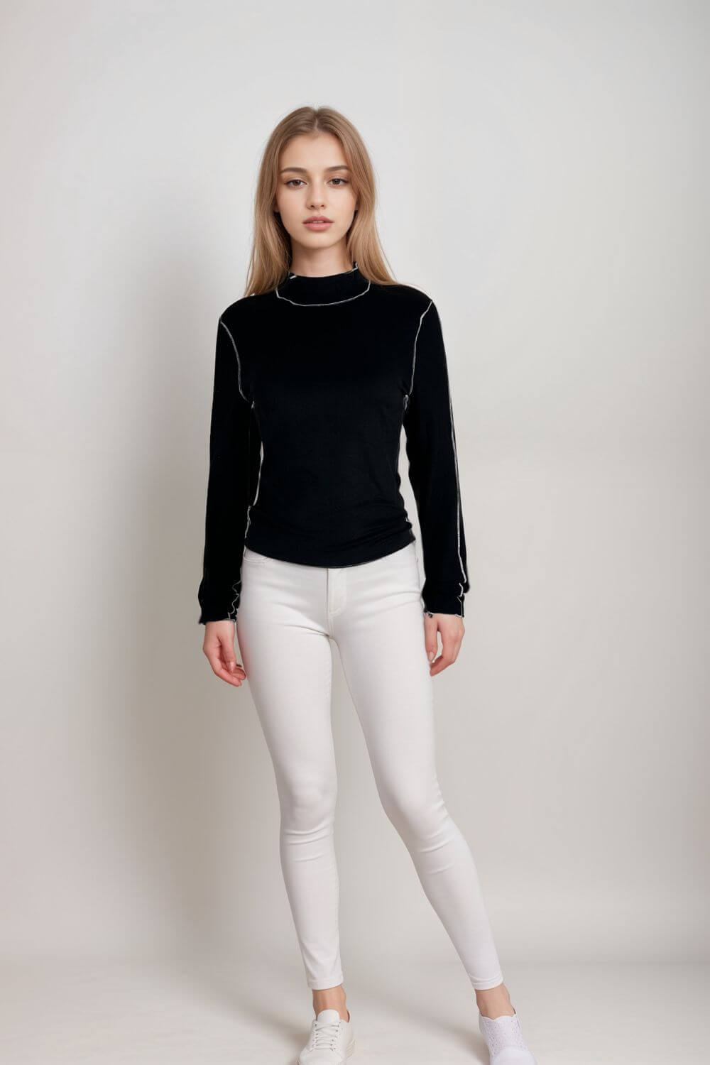 Women’s black long sleeve top slim fit high neck tee with contrast stitch detail