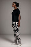 Women’s black pyjama set short sleeve top with abstract print trousers