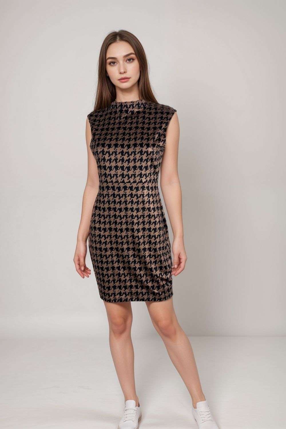 Black and white houndstooth sleeveless bodycon mini dress, showcasing a fitted silhouette and chic style.
