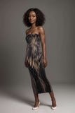 Model wearing a black and gold striped bodycon midi dress with a strapless design and a sleek silhouette.