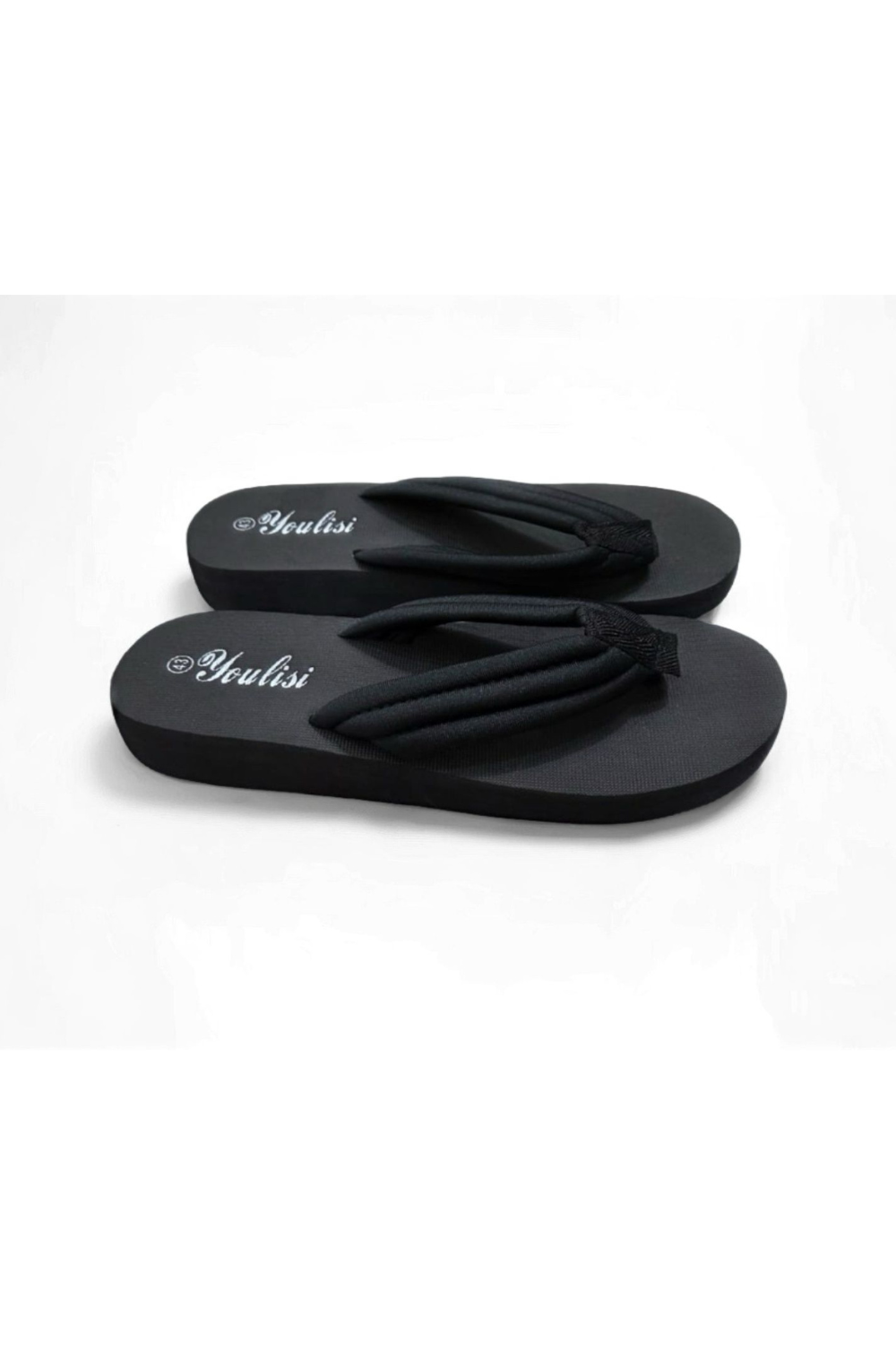 Pair of black platform flip flops with cushioned straps
