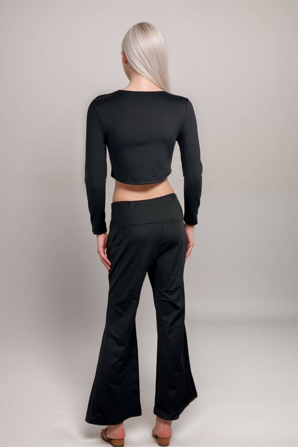Women’s black co-ord set long sleeve crop top with flared trousers two piece outfit
